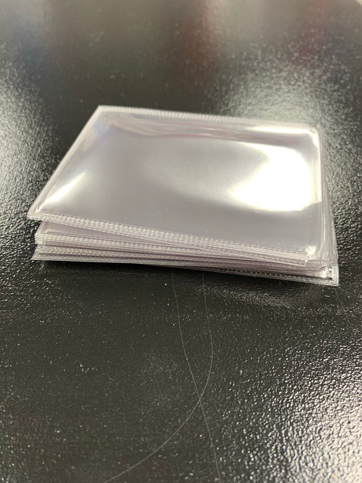 THICK PLASTIC CARD SAVER SLEEVES - SOLD IN BUNDLES OF 25's